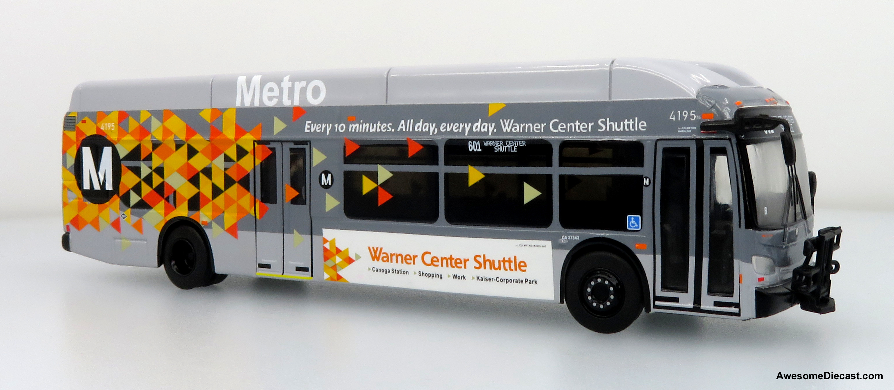 What is the destination displayed on the model bus?