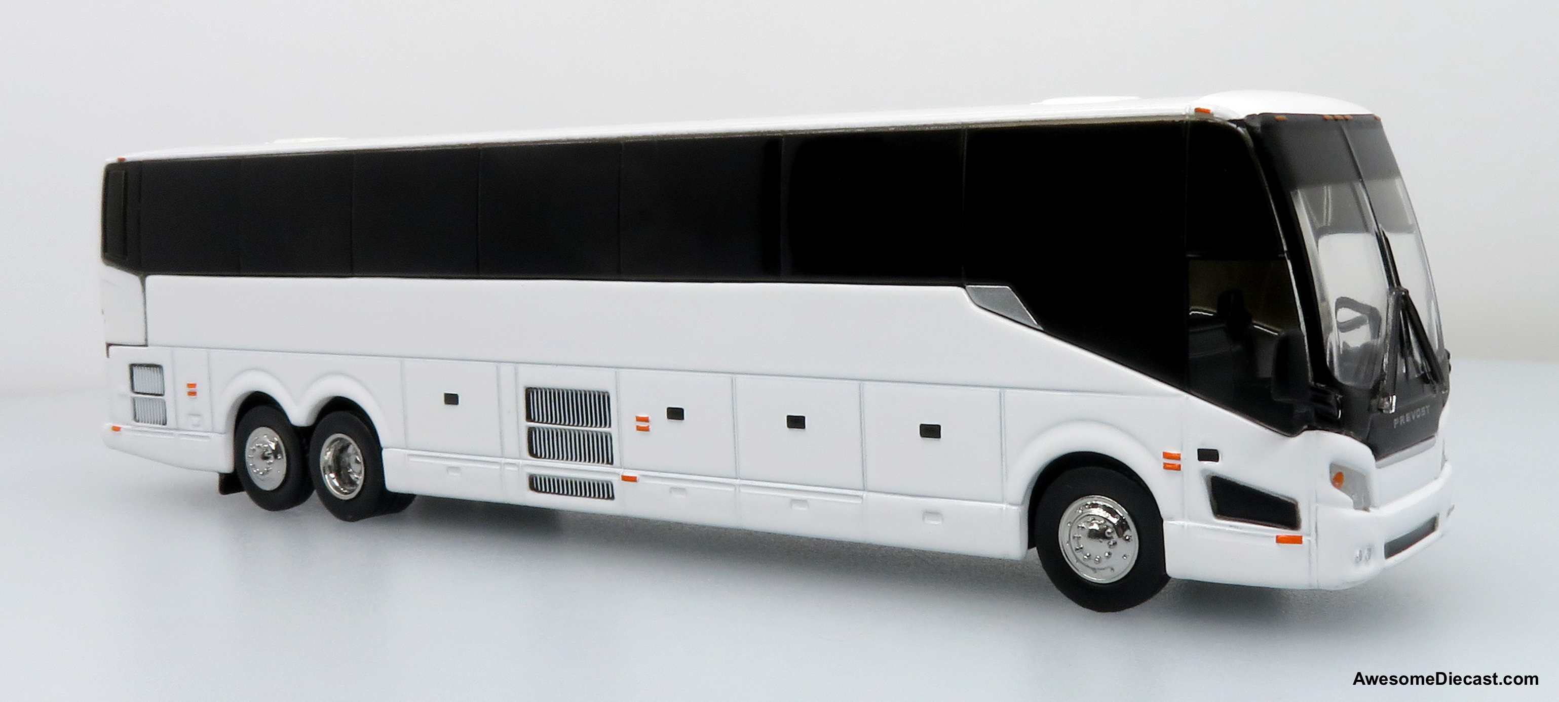 What company owns Prevost?