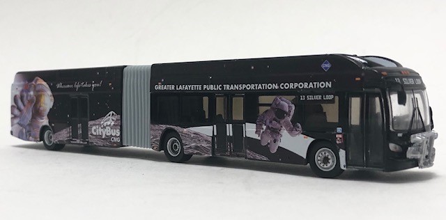 What is the destination displayed on the transit bus model?